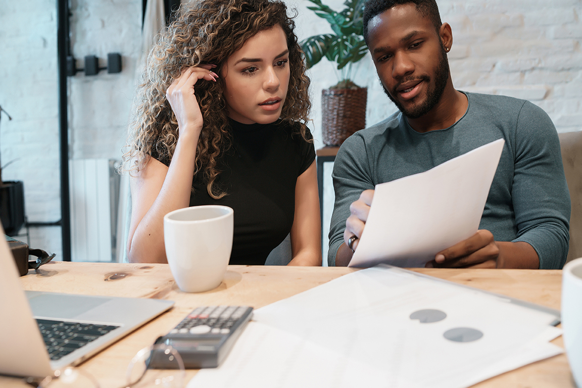couple reading an energy bill