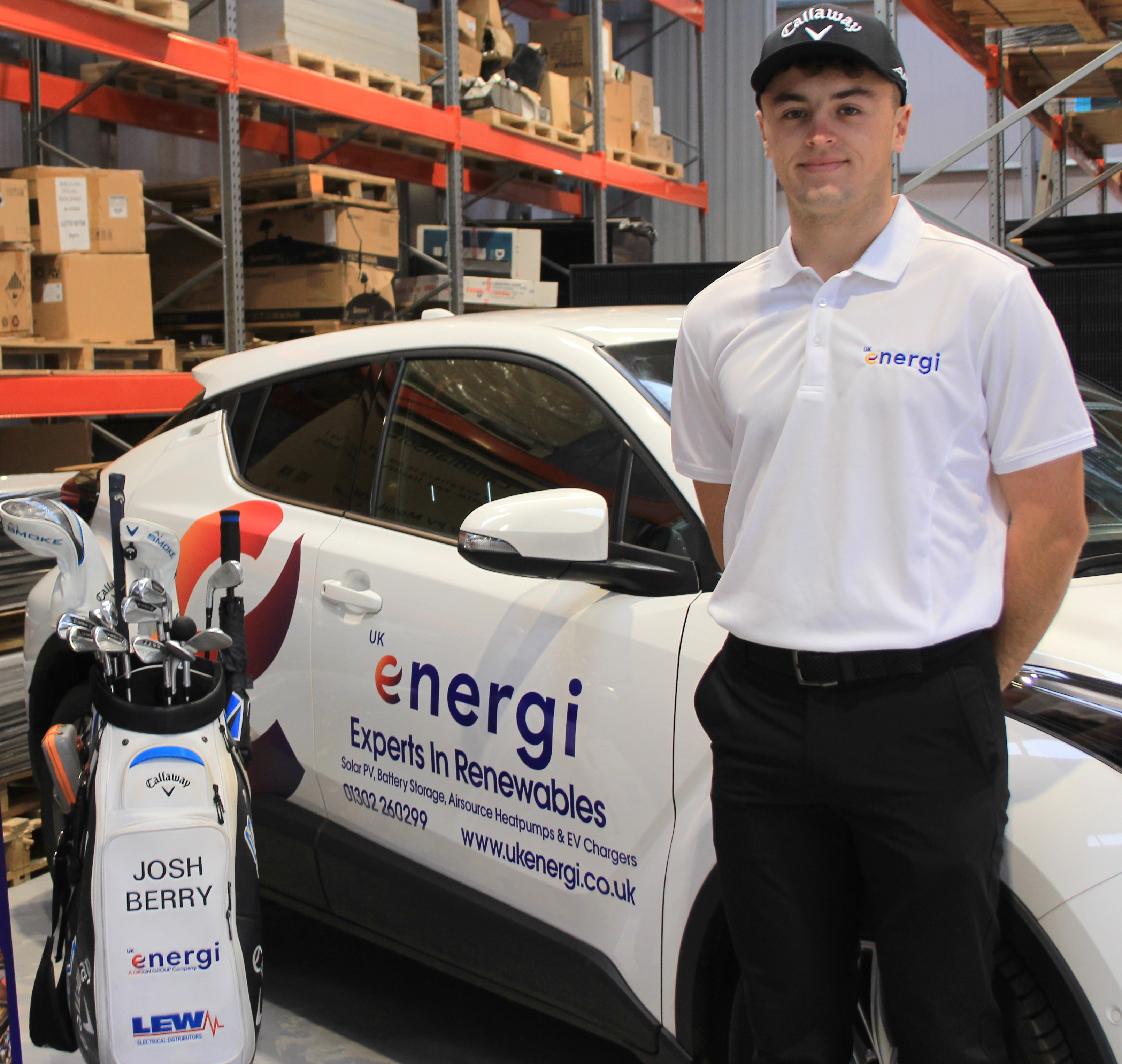 Josh Berry in the UK Energi warehouse with liveried golf bag and car