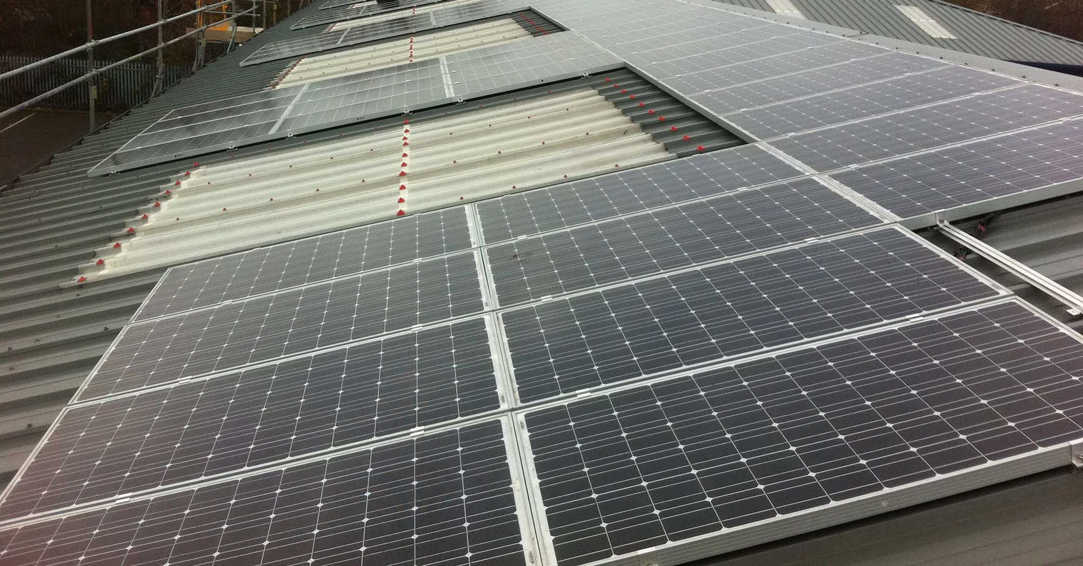 Solar panels installed on roof of building